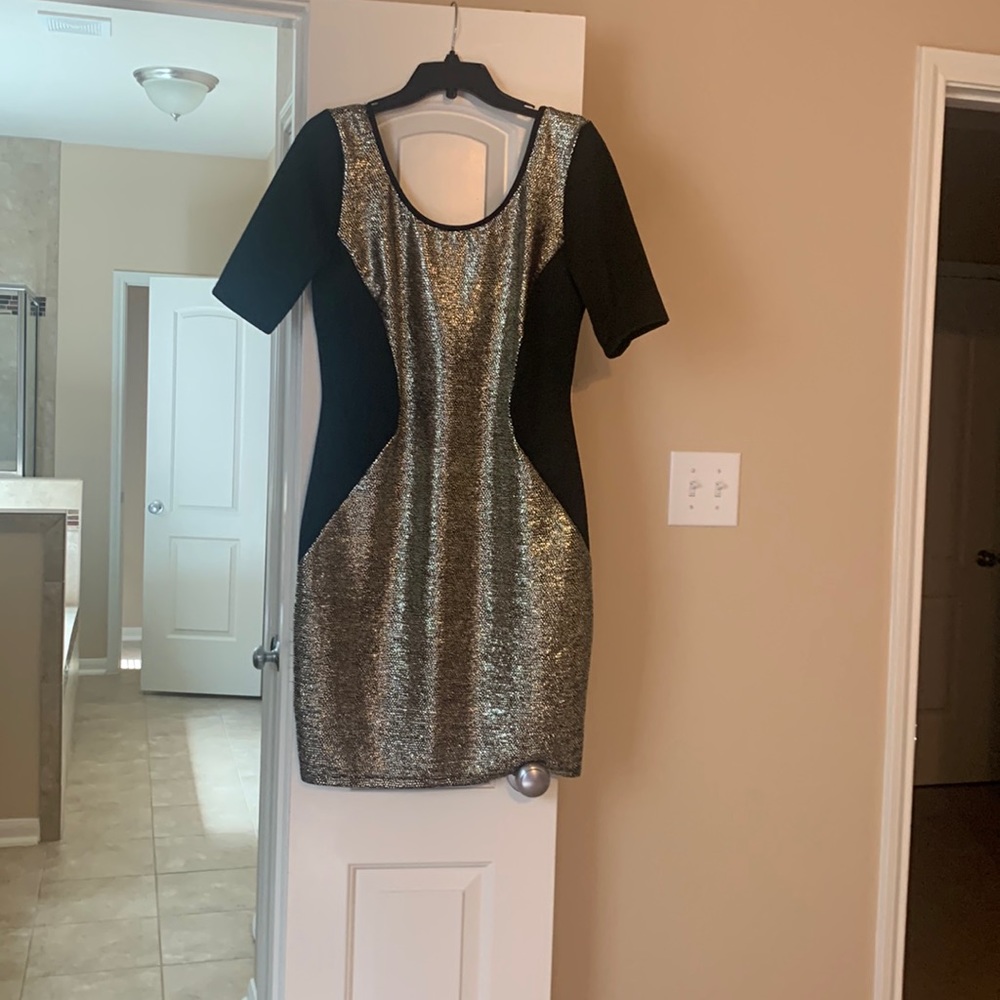 Cute silver and black dress. NWT never worn.